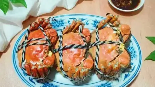 大螃蟹吃什么食物怎么养(大闸螃蟹吃什么食物好养活)